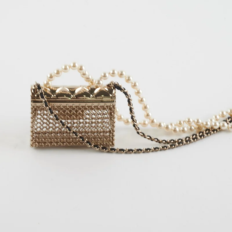 Chanel bags with exclusive seasonal designs and materialsChanel Flap Bag with Chain Pearls Costume Jewellery