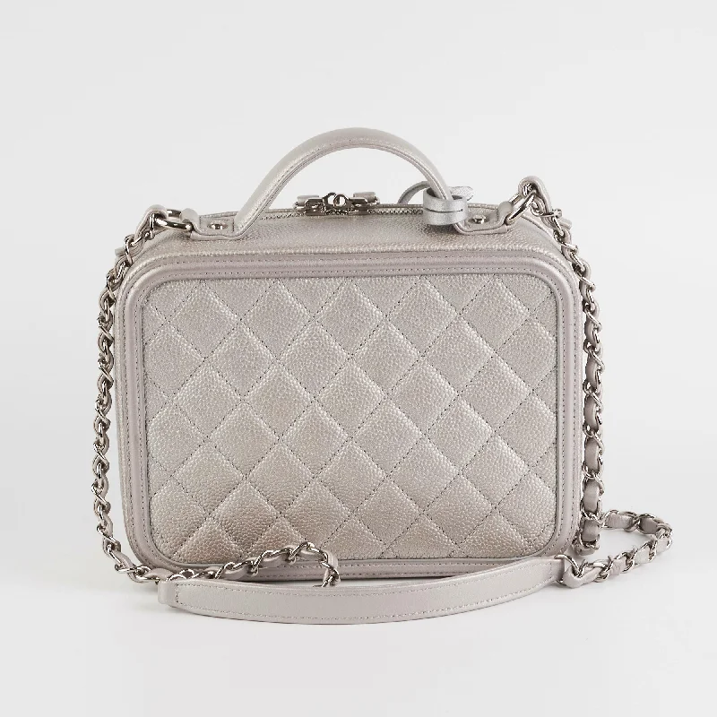 Chanel bags with exclusive seasonal designs and materialsChanel Filigree Silver Caviar Medium Vanity