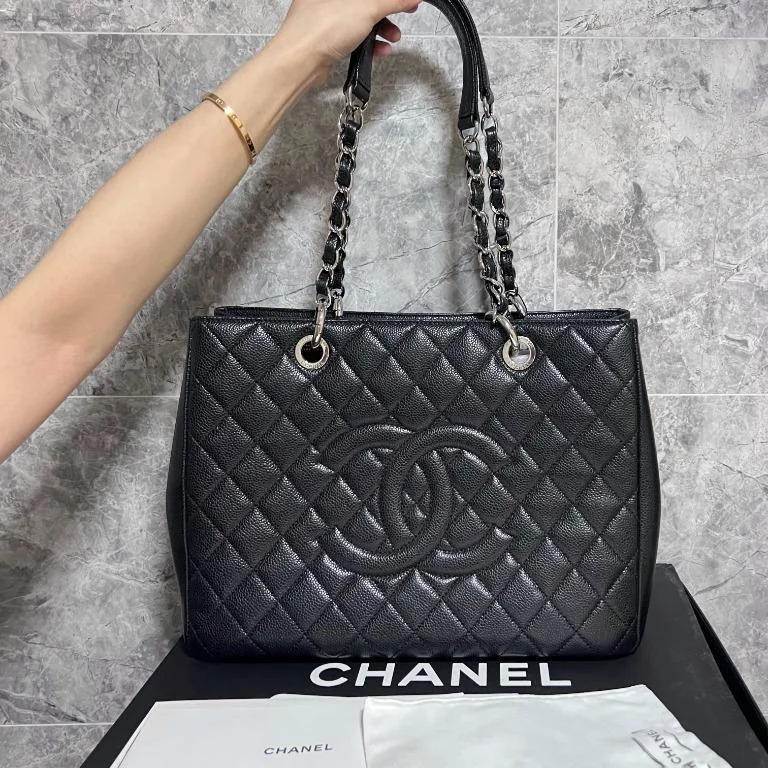 Chanel bags with exclusive seasonal designs and materialsBlack Grand Shopping Tote GST with Silver Hardware Caviar