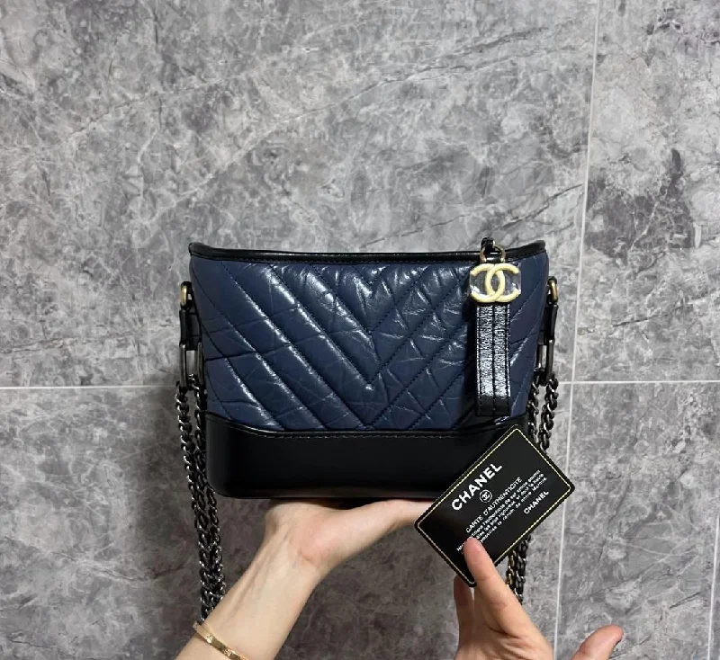 Chanel bags with exclusive seasonal designs and materialsBNIB Chanel Small Gabrielle Calfskin Navy Blue Chevron No 27