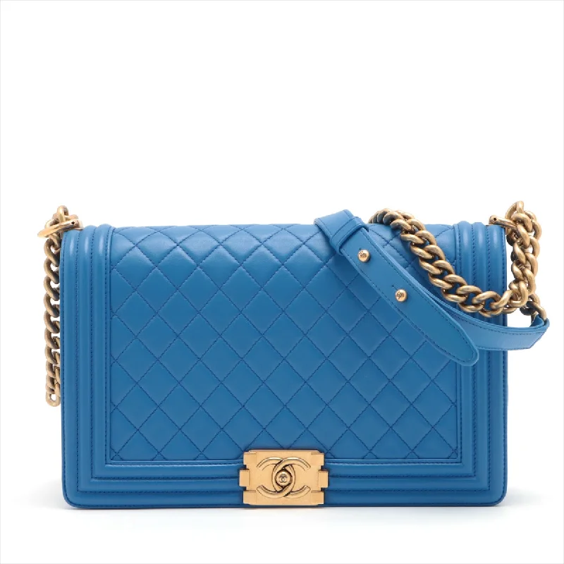 Chanel bags with exclusive seasonal designs and materialsCHANEL Boy Chain Shoulder Bag in Lambskin Blue