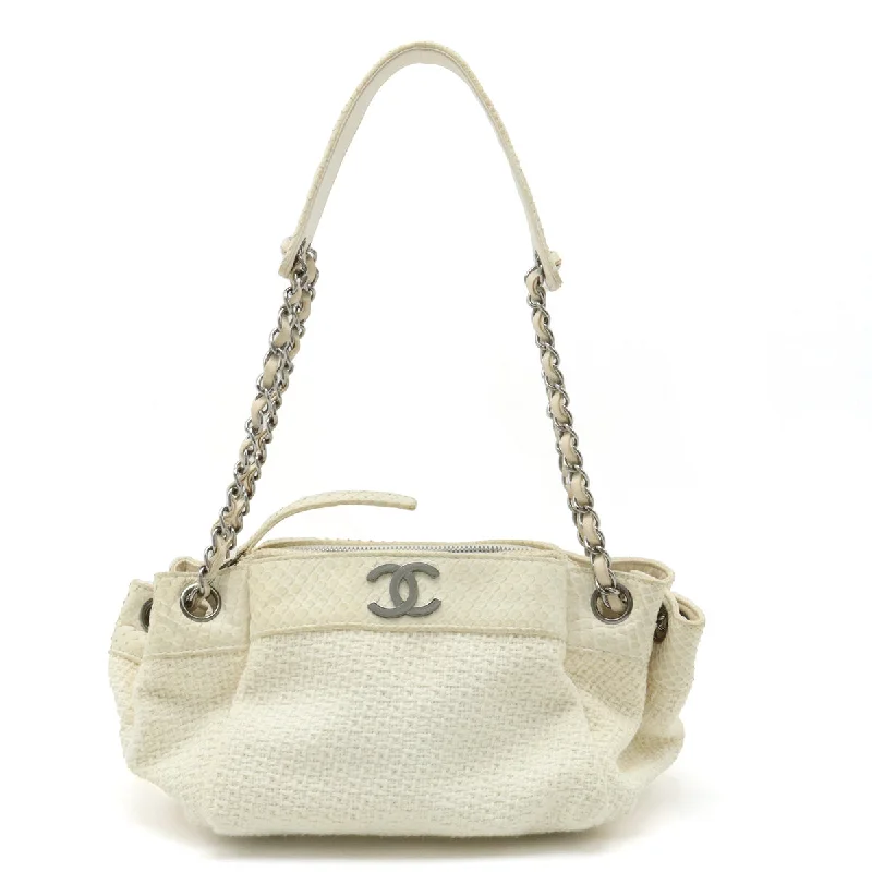 Chanel bags with exclusive seasonal designs and materialsCHANEL Chanel Cocomark Wrapped Chain Bag One-Shoulder Shoulder Bag Cotton Canvas Pearson Ivory White Blumin