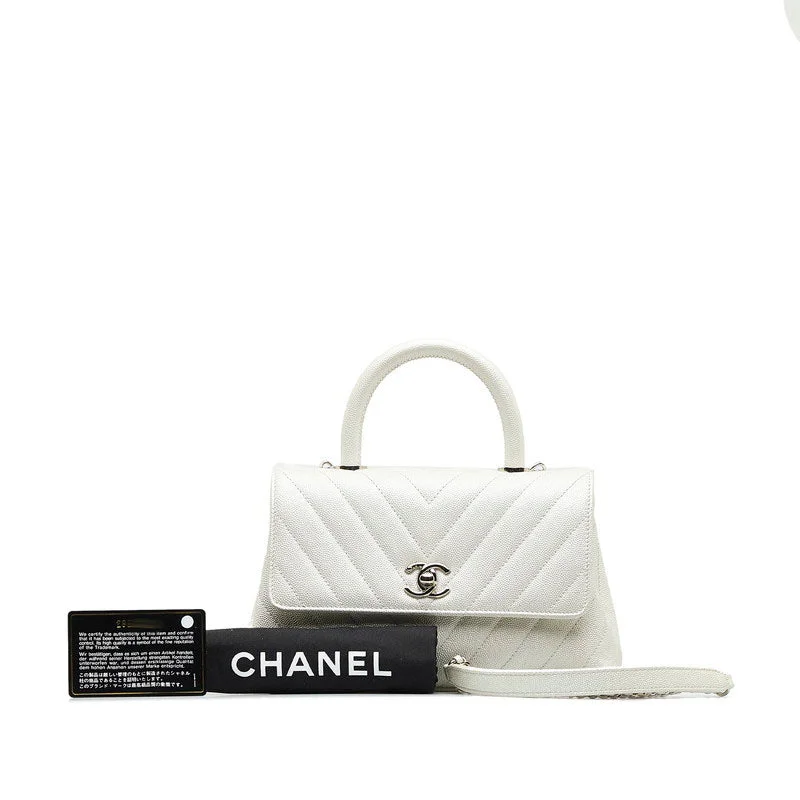 Chanel bags with exclusive seasonal designs and materialsChanel Chevron V tick Coco Handle Handbag Shoulder Bag 2WAY White Caviar S  CHANEL