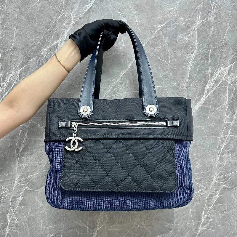 Chanel bags with exclusive seasonal designs and materialsLarge Tote Black Navy Blue SHW