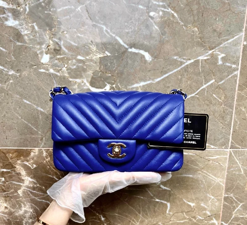 Chanel bags with exclusive seasonal designs and materialsLNIB Mini Classic Flap Rectangular Mini Lambskin Blue Chevron SHW No 24