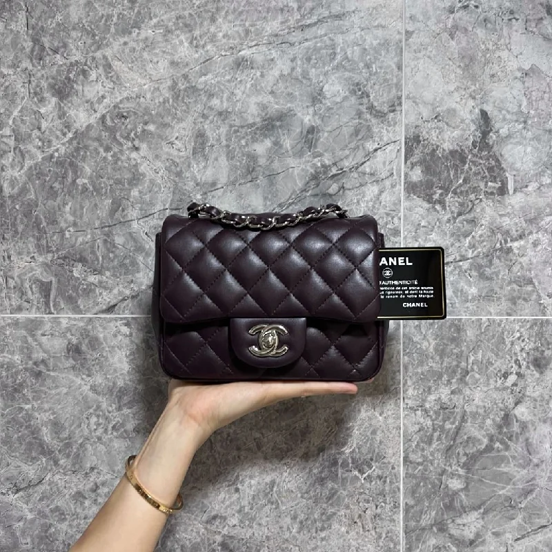 Chanel bags with exclusive seasonal designs and materialsLNIB Mini Square Classic Flap Lambskin Dark Violet No 30