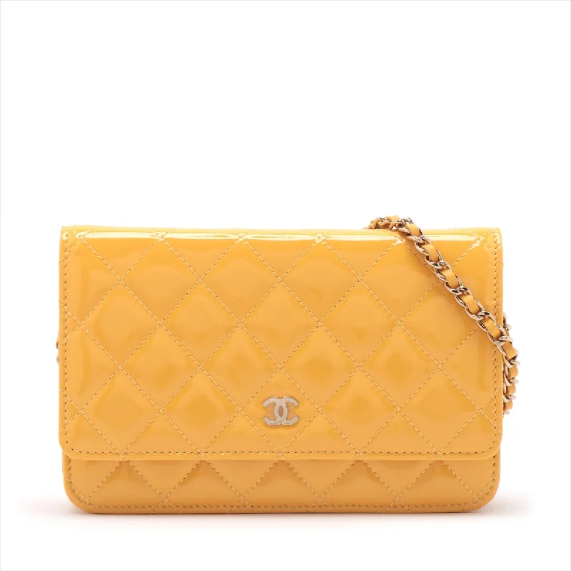 Chanel bags with exclusive seasonal designs and materialsCHANEL Wallet on Chain in Patent Yellow